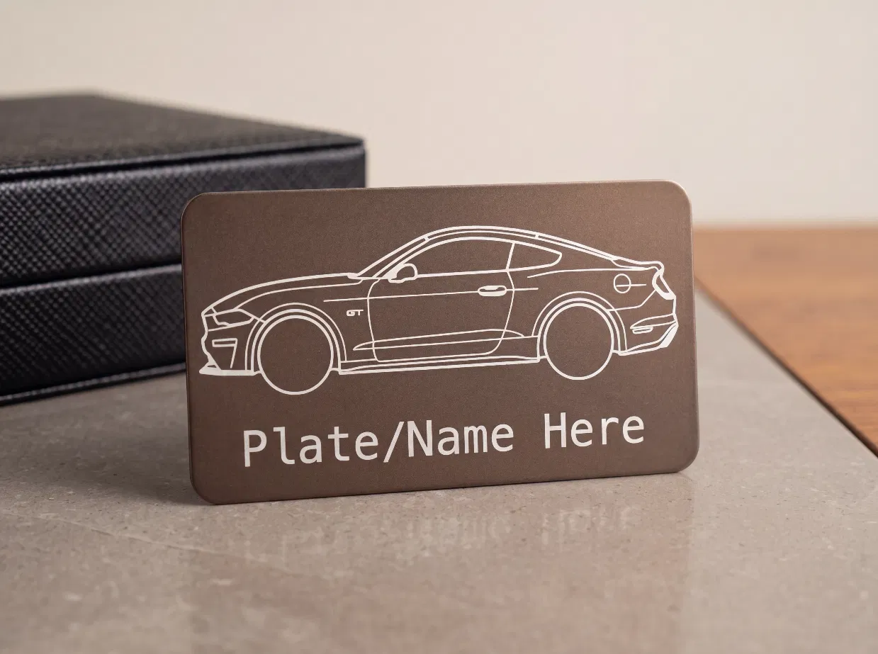 Bronze metal tag laser engraved with a muscle car profile and custom name